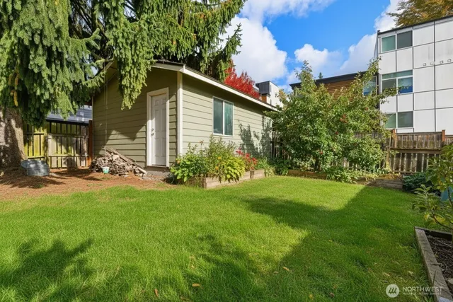 a backyard of a house with lots of green space