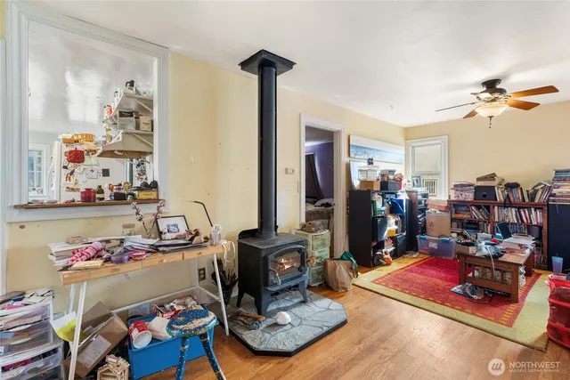 a room with gym equipment and a view of bedroom
