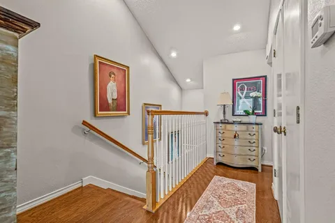 a view of a hallway with workspace