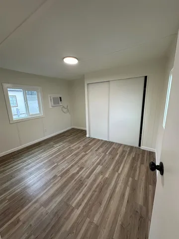 a view of an empty room and window