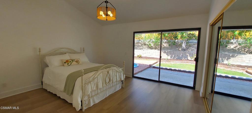 3477 Vicki Court Simi Valley, CA 93063 - Photo 8 of 23 a bedroom with a bed and a view of a window