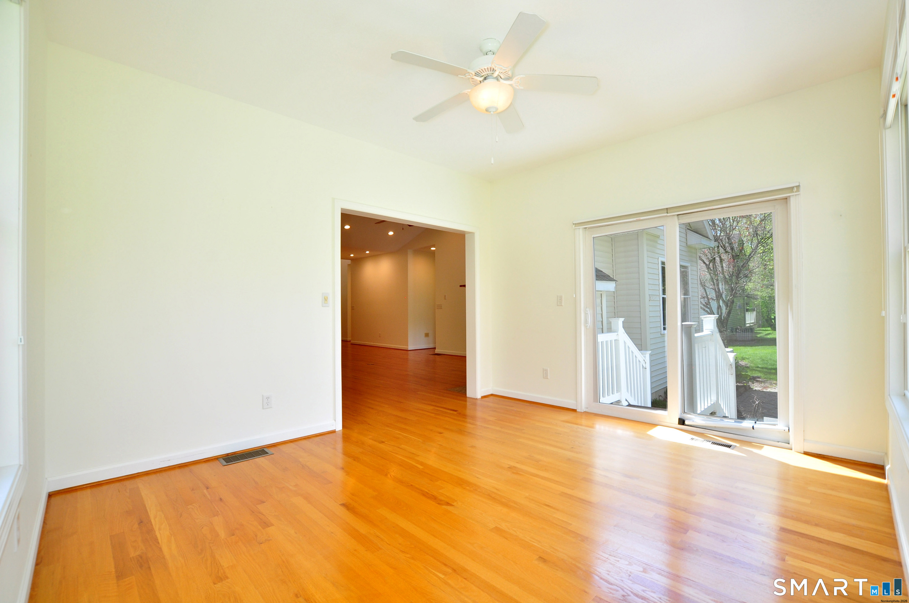 453 Tributary Lane Windsor, CT 06095 - Photo 19 of 37 a view of an empty room with glass door