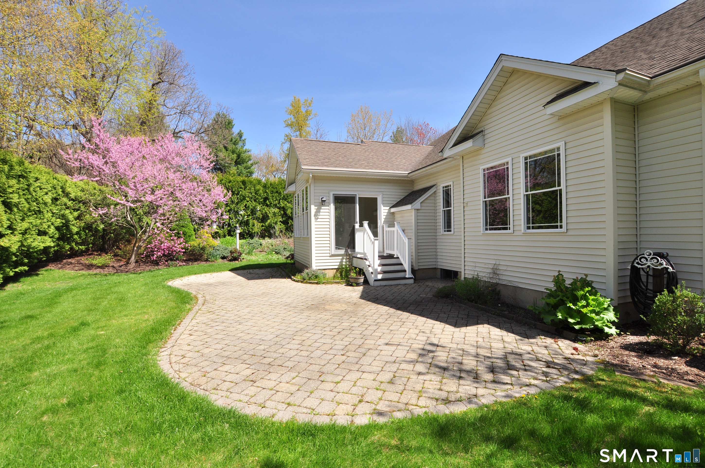 453 Tributary Lane Windsor, CT 06095 - Photo 31 of 37 a view of a house with backyard and garden