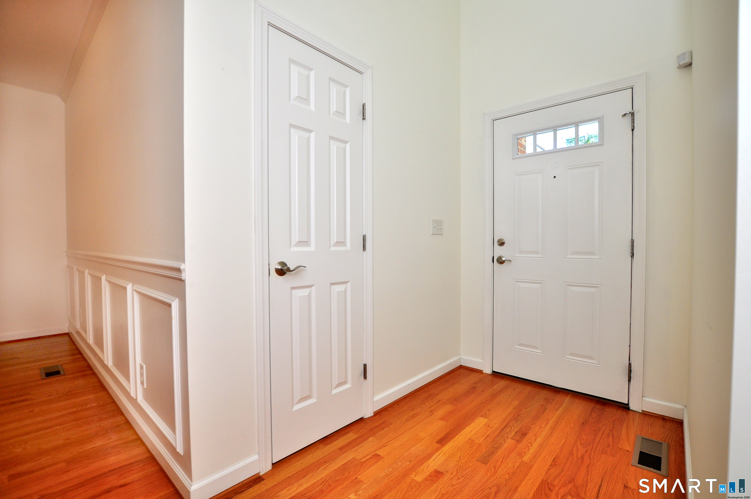453 Tributary Lane Windsor, CT 06095 - Photo 4 of 37 a view of an entryway with wooden floor