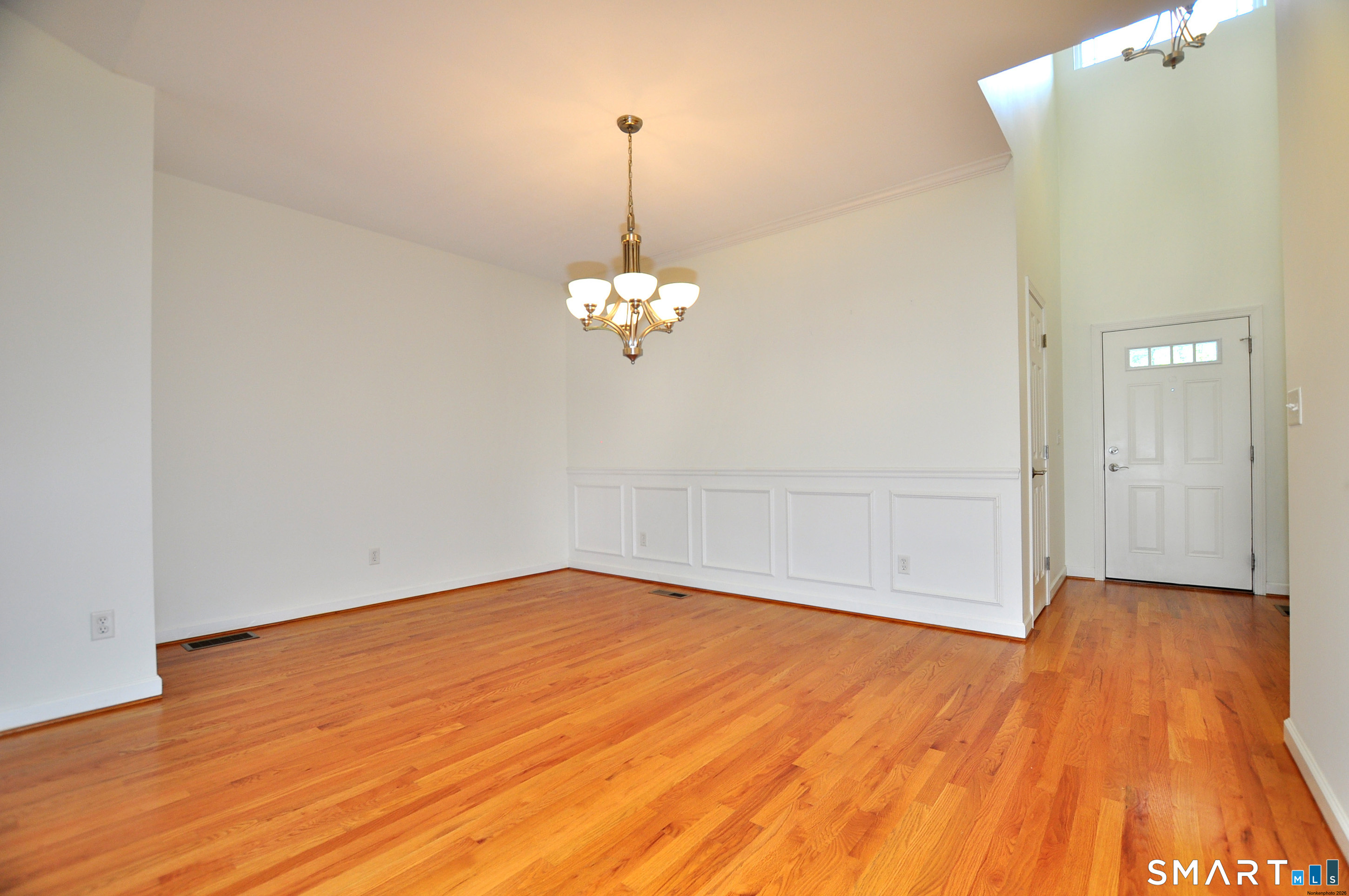 453 Tributary Lane Windsor, CT 06095 - Photo 5 of 37 a view of empty room with wooden floor and fan