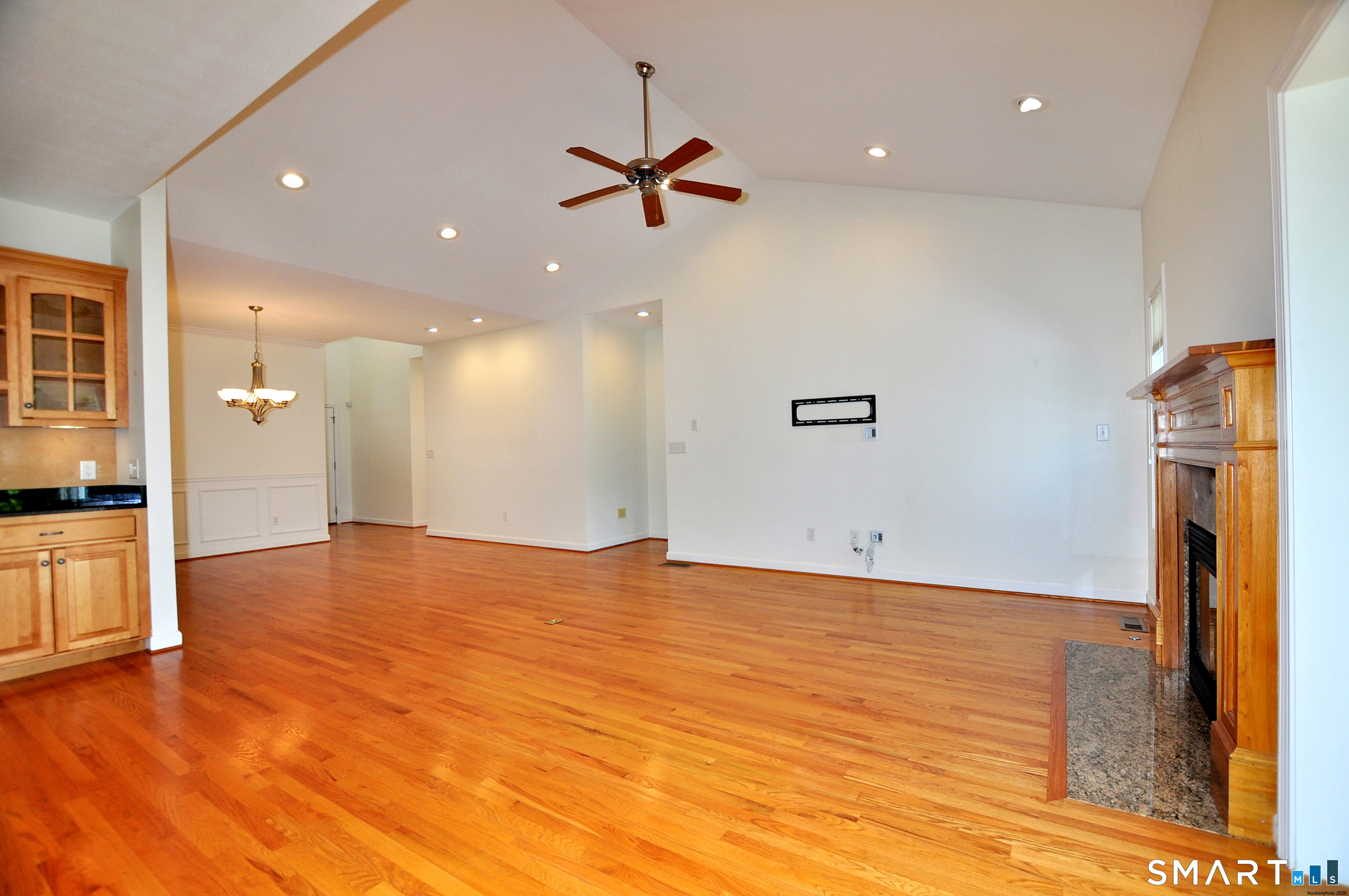453 Tributary Lane Windsor, CT 06095 - Photo 7 of 37 a view of a livingroom with a fireplace