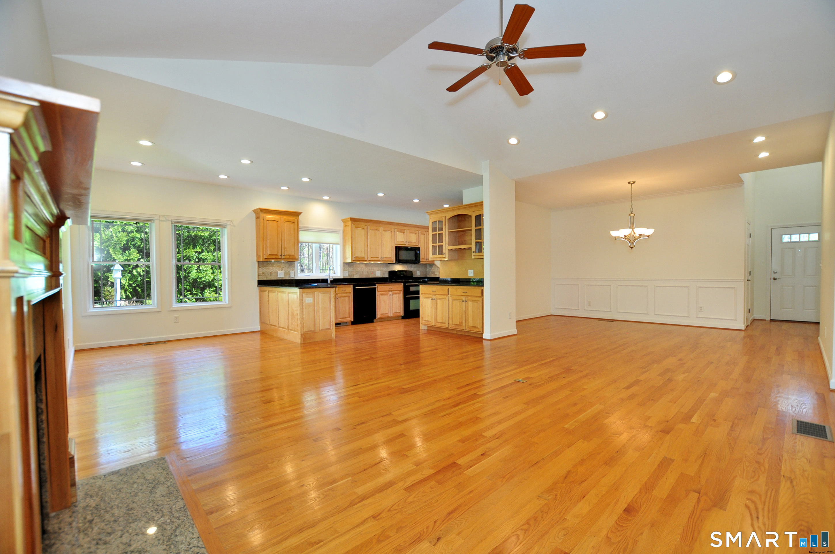 453 Tributary Lane Windsor, CT 06095 - Photo 10 of 37 a view of kitchen and hall with wooden floor