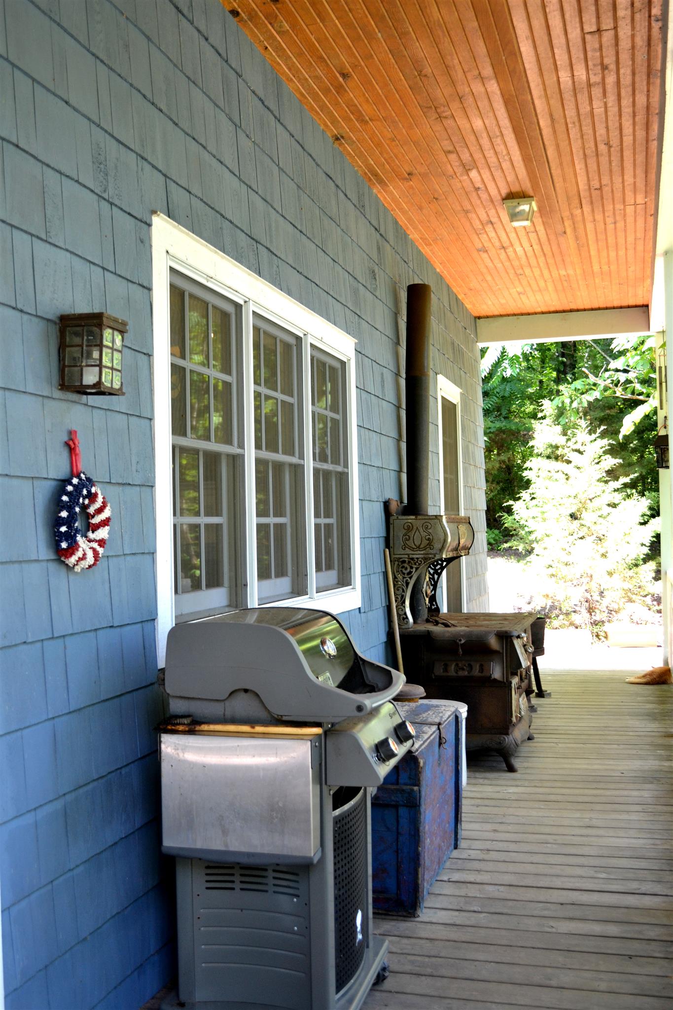 76 Buffalo Road Carthage, TN 37030 - Photo 23 of 30 a table and chairs in front of a house