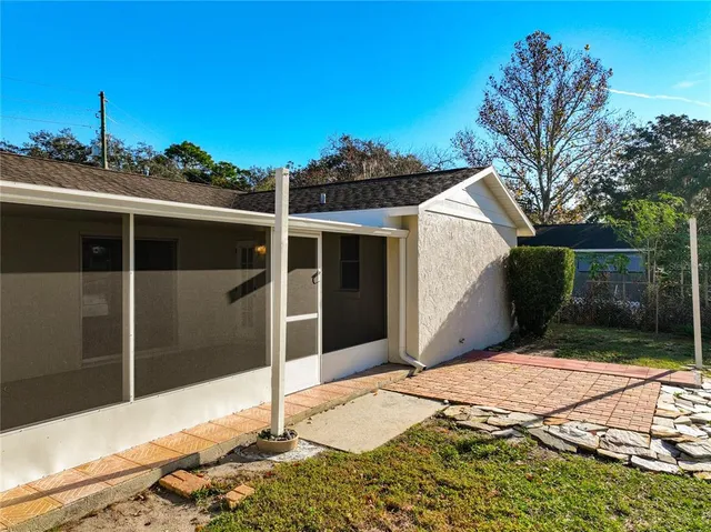 a view of back yard with green space