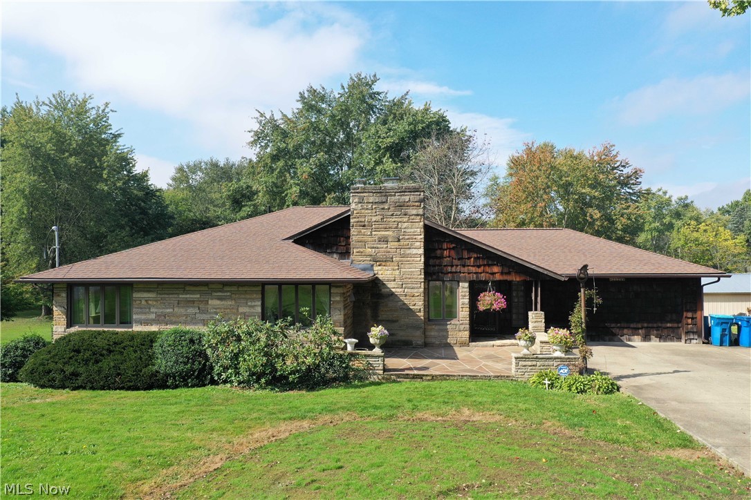 2128 Pressler Road Akron, OH 44312 - Photo 1 of 35 Welcome to this lovely well-maintained ranch that sits in almost an acre lot in Springfield School District.