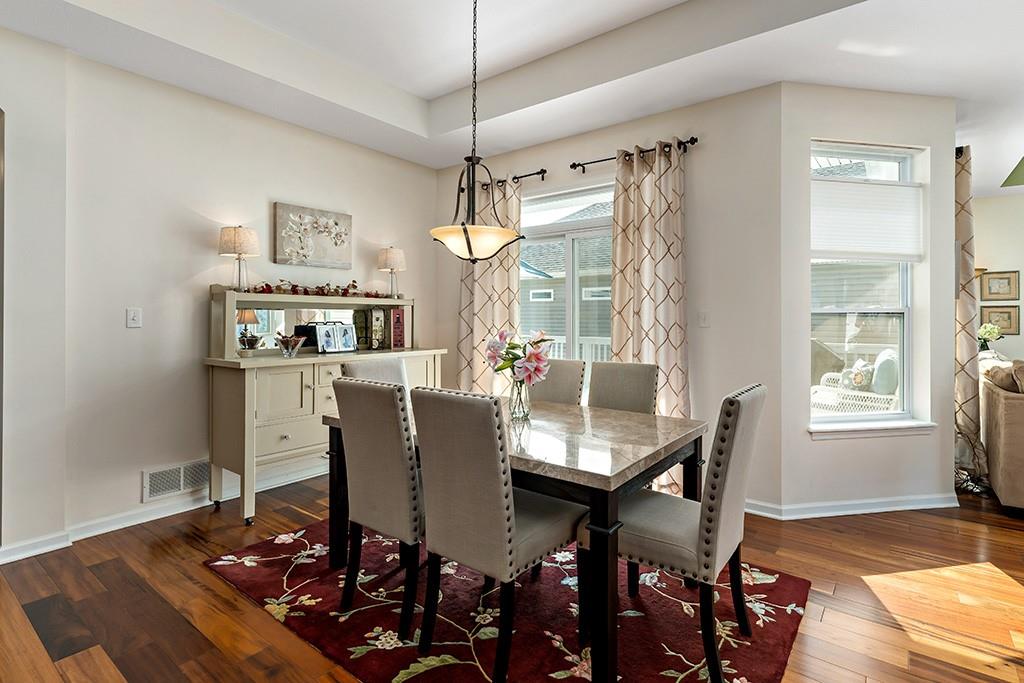 137 Cobblestone Drive Pittsburgh, PA 15237 - Photo 14 of 39 a view of a dining room with furniture and wooden floor