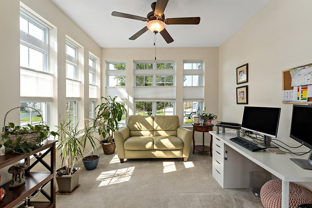 137 Cobblestone Drive Pittsburgh, PA 15237 - Photo 16 of 39 a living room with furniture a chandelier and a window