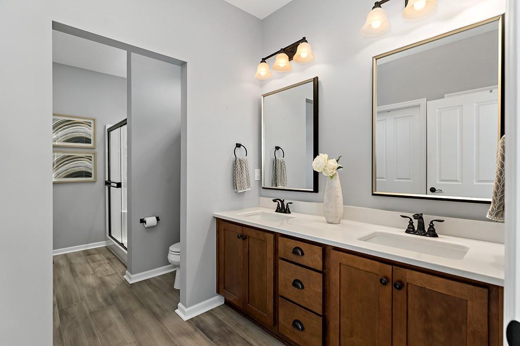 137 Cobblestone Drive Pittsburgh, PA 15237 - Photo 22 of 39 a bathroom with a double vanity sink mirror and shower