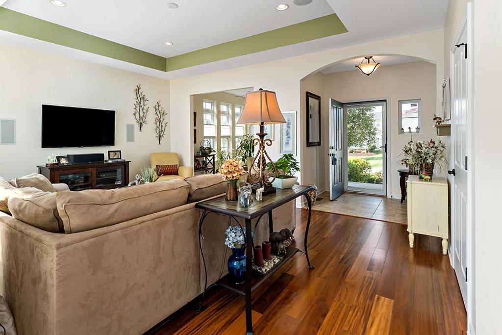 137 Cobblestone Drive Pittsburgh, PA 15237 - Photo 8 of 39 a living room with furniture and a flat screen tv