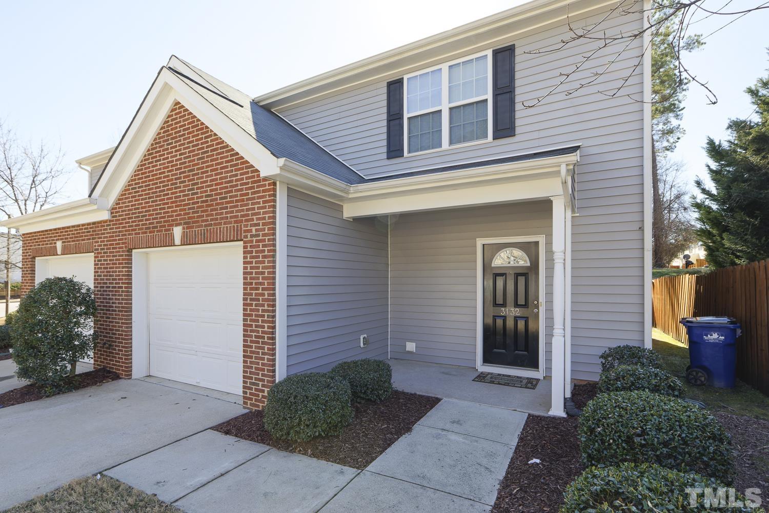 3132 Manhasset Lane Raleigh, NC 27604 - Photo 1 of 10 a front view of a house with garden