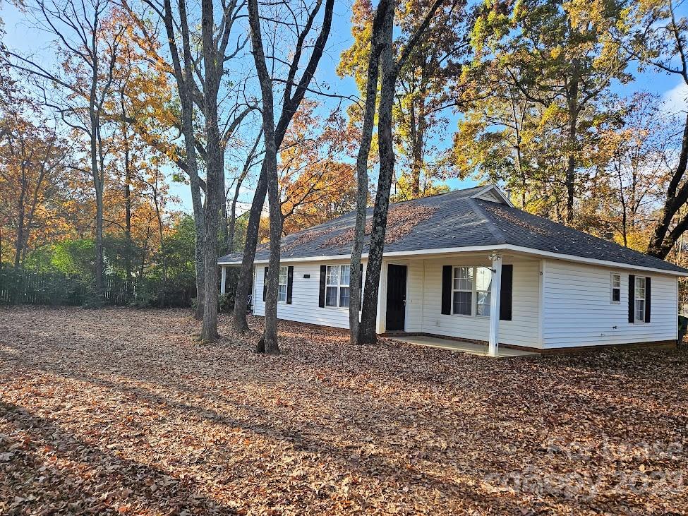 1205 Auten Road, Unit B Charlotte, NC 28216 - Photo 1 of 14 front view of a house with a yard
