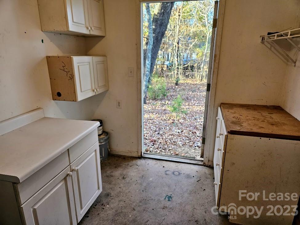 1205 Auten Road, Unit B Charlotte, NC 28216 - Photo 13 of 14 a utility room with dryer and washer