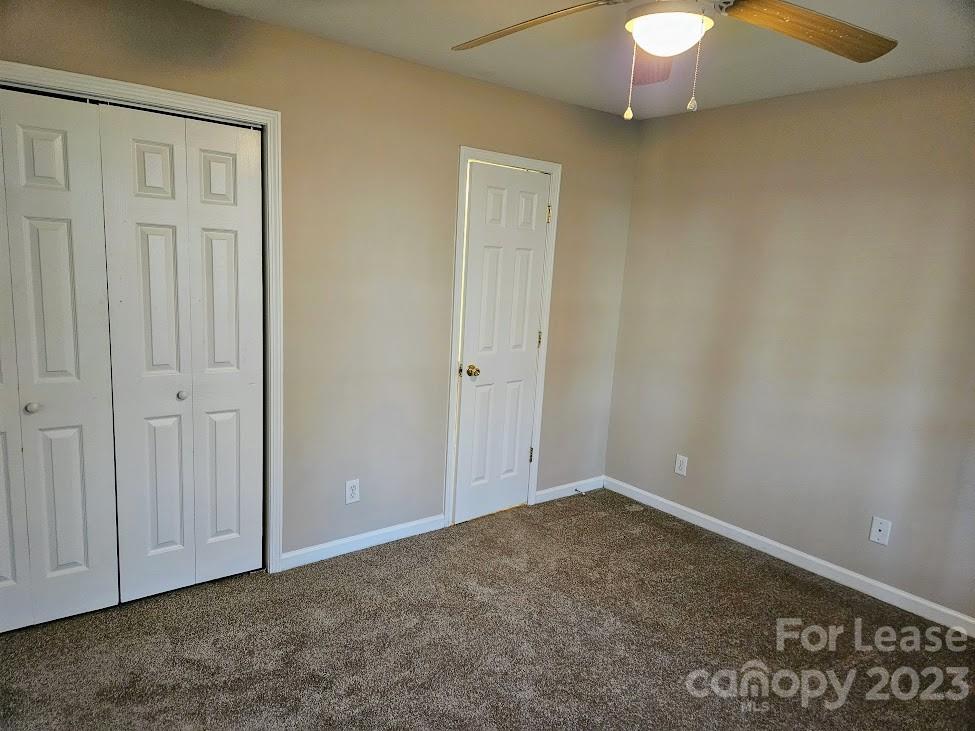 1205 Auten Road, Unit B Charlotte, NC 28216 - Photo 8 of 14 an empty room with a window