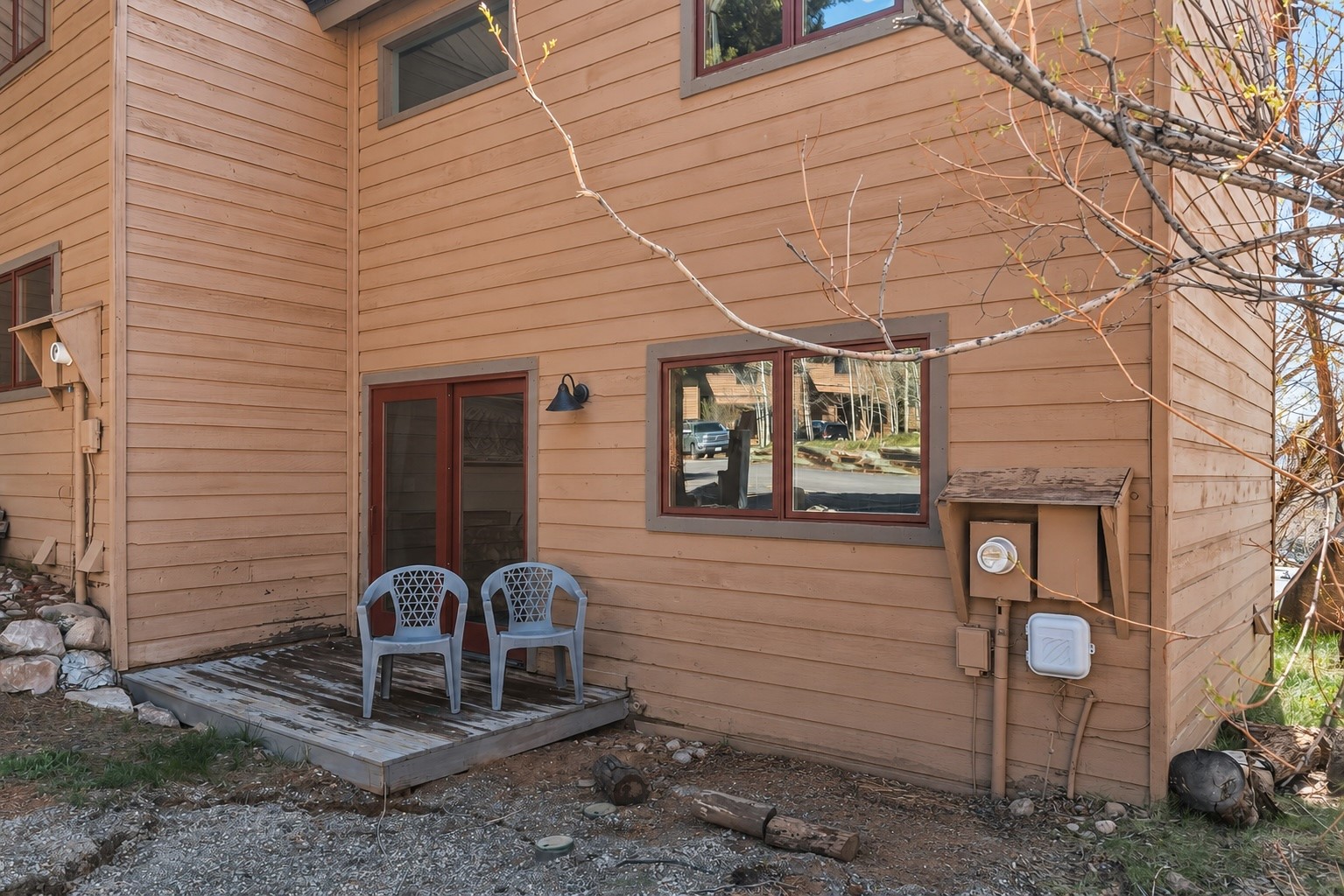 6734 Ryan Gulch Road, Unit 6734 Silverthorne, CO 80498 - Photo 29 of 33 a front view of a house with garden