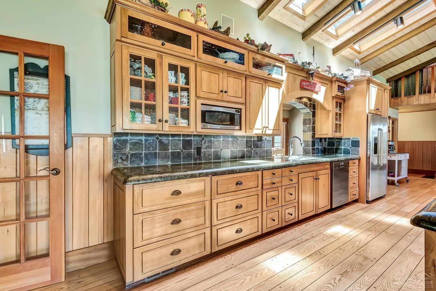 69652 Camp Polk Road Sisters, OR 97759 - Photo 8 of 25 Quality cabinetry and granite countertop