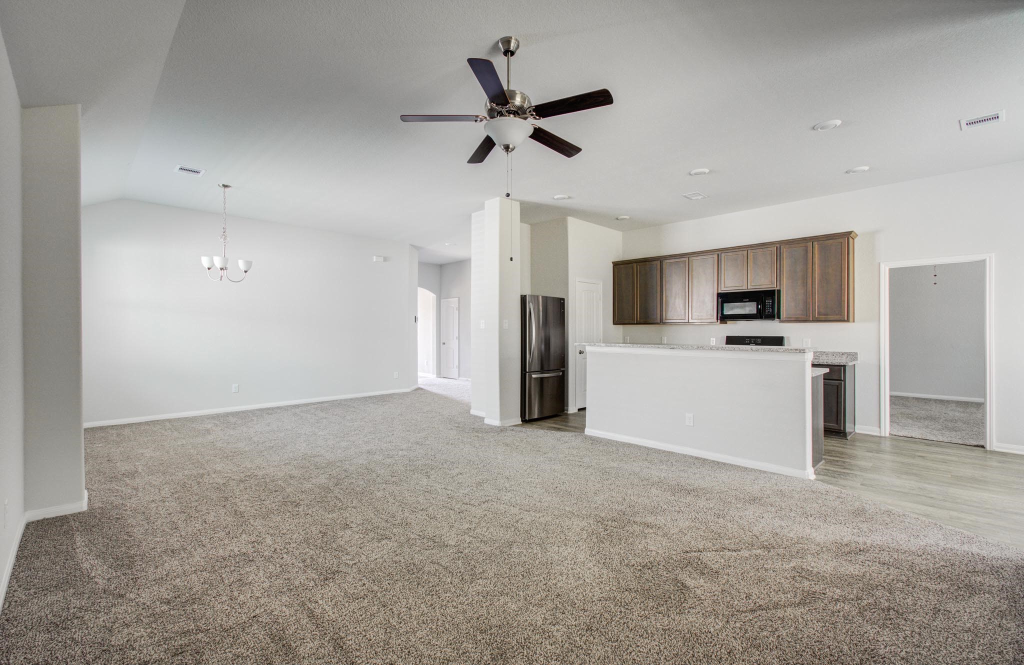 2009 Cedar Lane Conroe, TX 77301 - Photo 7 of 29 Kitchen looks into living area