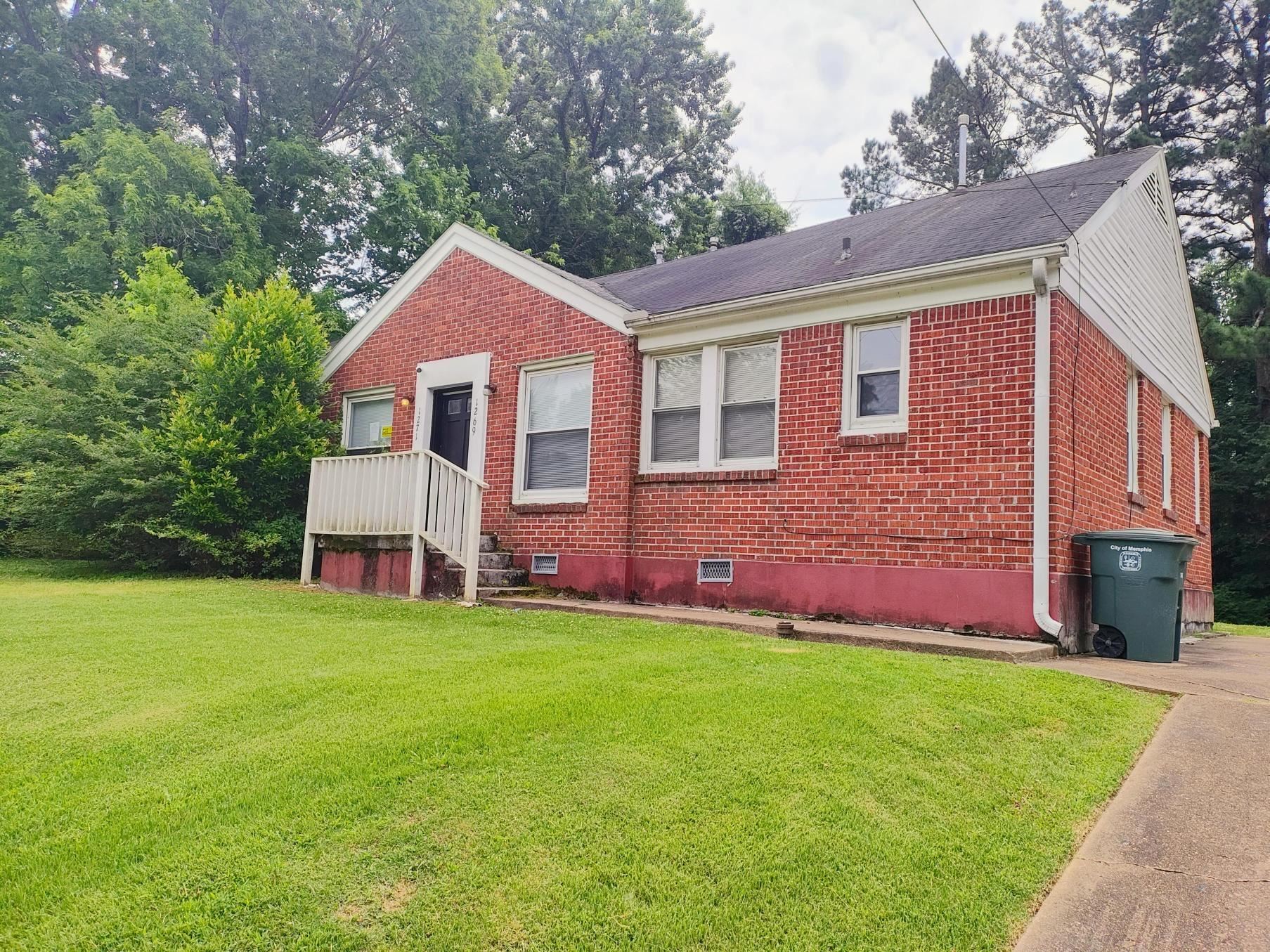 1271 Carrolton Road Memphis, TN 38127 - Photo 2 of 11 Bungalow featuring brick siding and a front yard