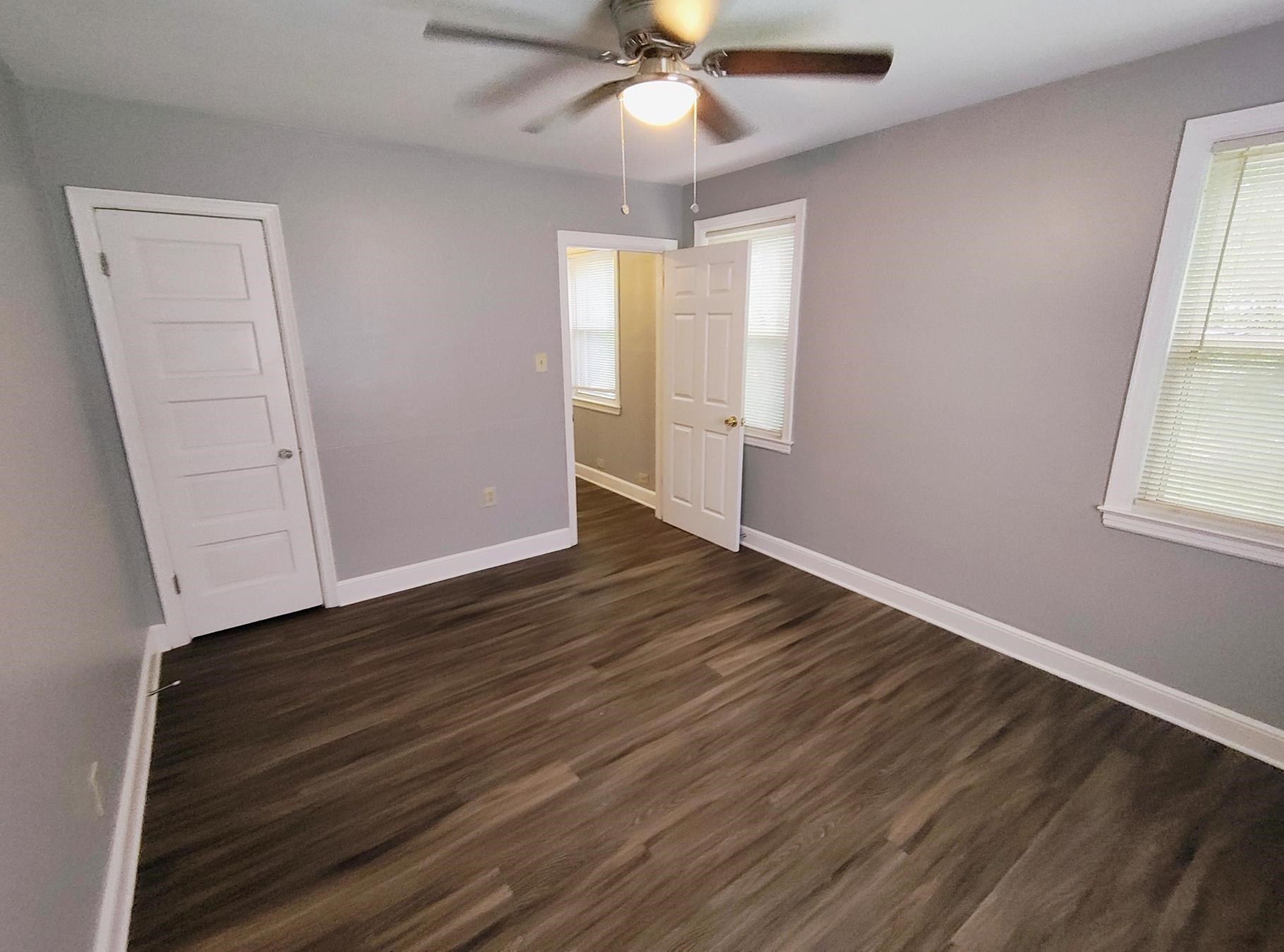 1271 Carrolton Road Memphis, TN 38127 - Photo 5 of 11 Unfurnished bedroom featuring dark wood-type flooring and ceiling fan