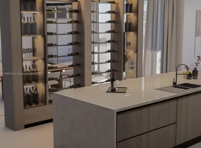 a kitchen with a sink and a refrigerator