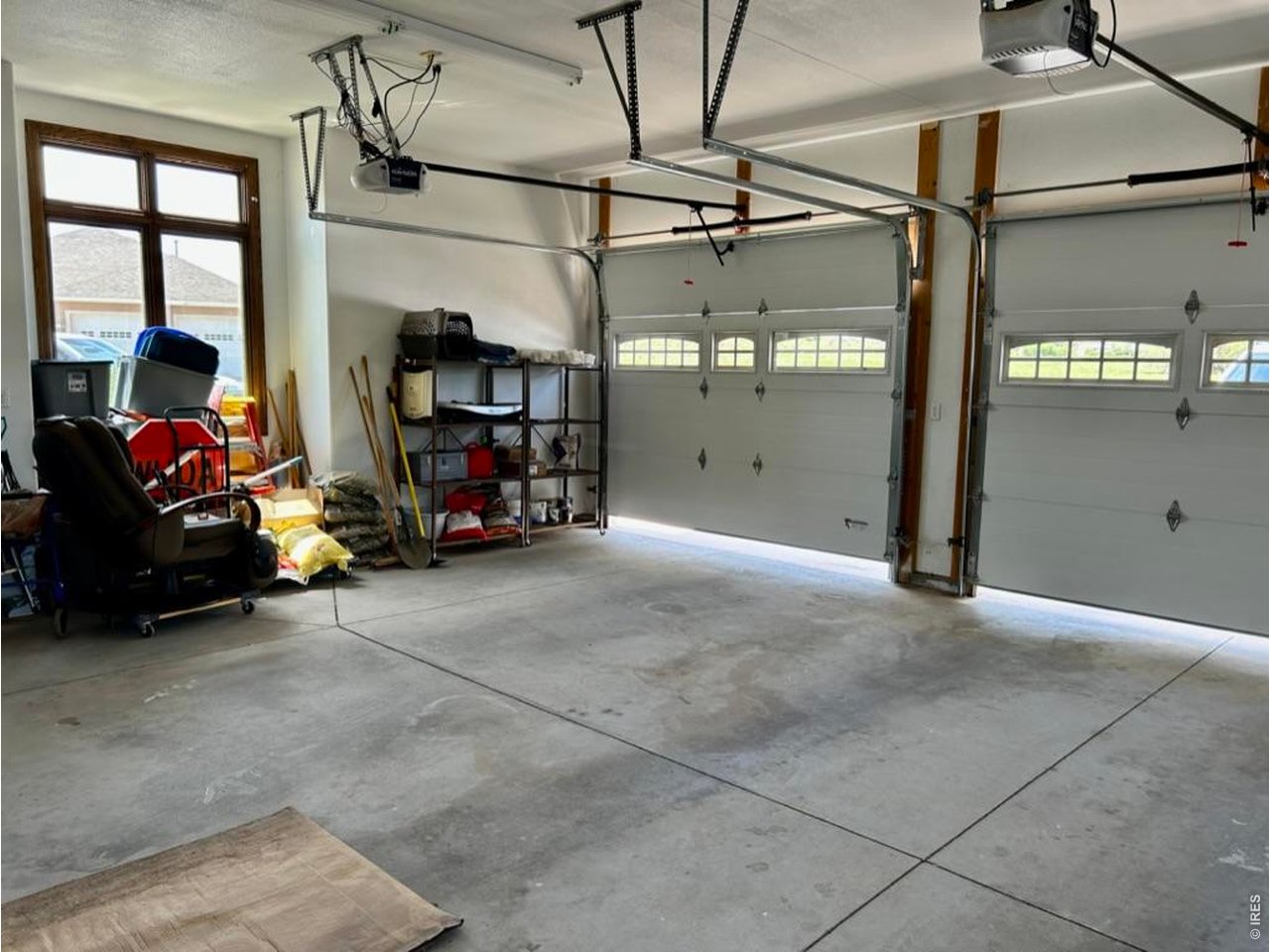 131 Club Road Sterling, CO 80751 - Photo 47 of 50 a view of a garage with the view of a living room