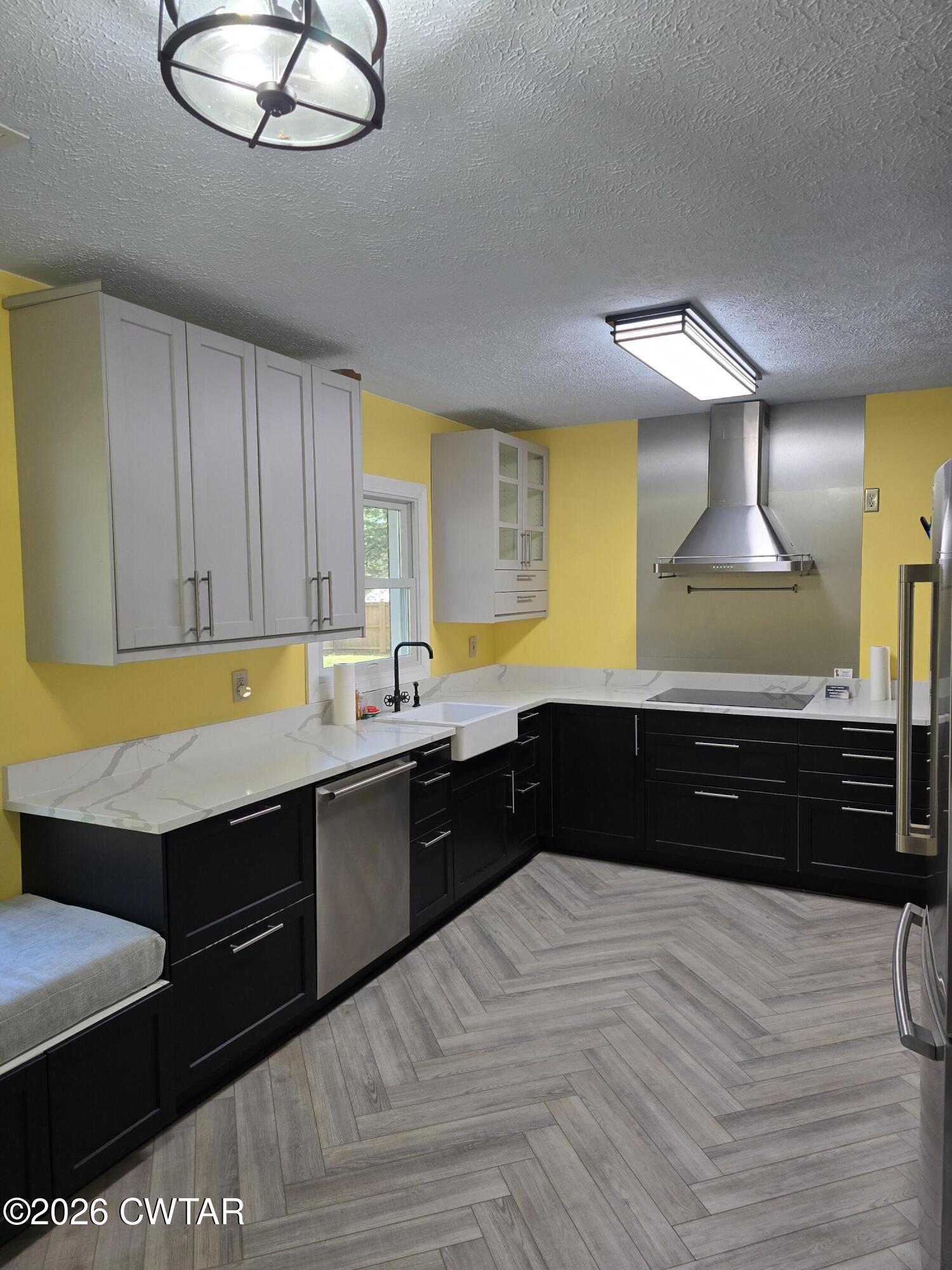 232 Russell Road Jackson, TN 38301 - Photo 16 of 30 a kitchen with a sink and cabinets