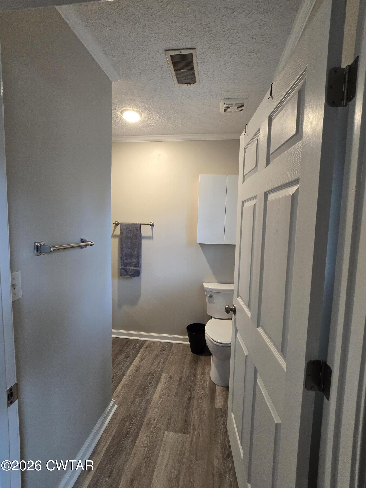 232 Russell Road Jackson, TN 38301 - Photo 24 of 30 a bathroom with a sink and toilet