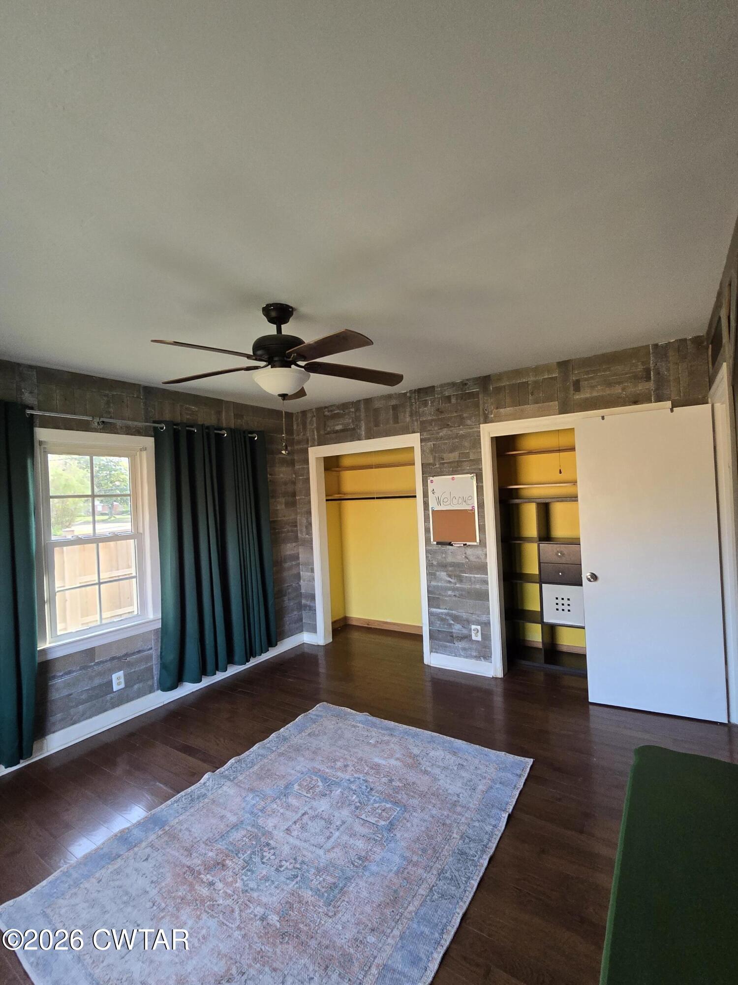 232 Russell Road Jackson, TN 38301 - Photo 27 of 30 wooden floor in an empty room with a window