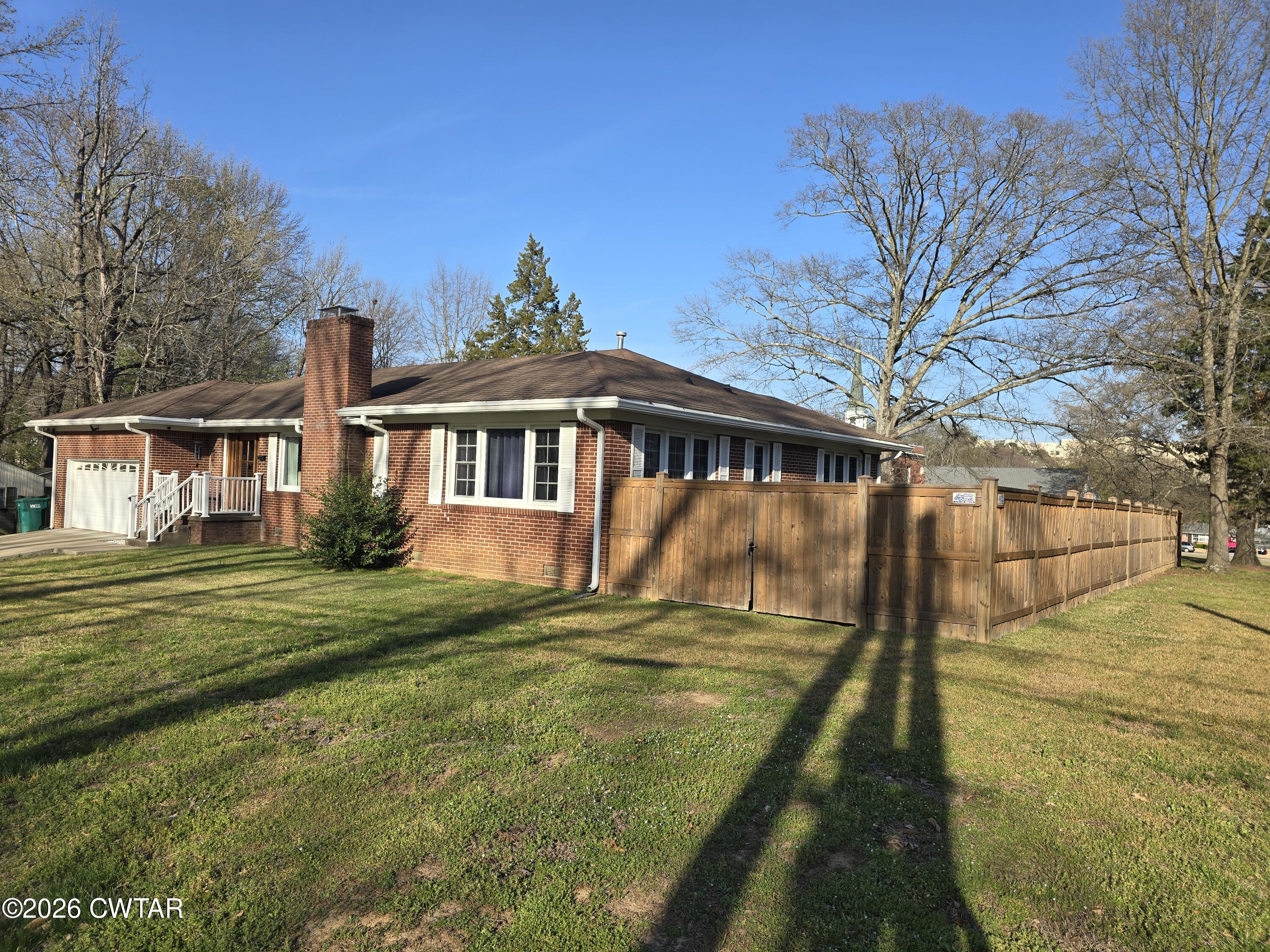 232 Russell Road Jackson, TN 38301 - Photo 3 of 30 a view of a house with a yard