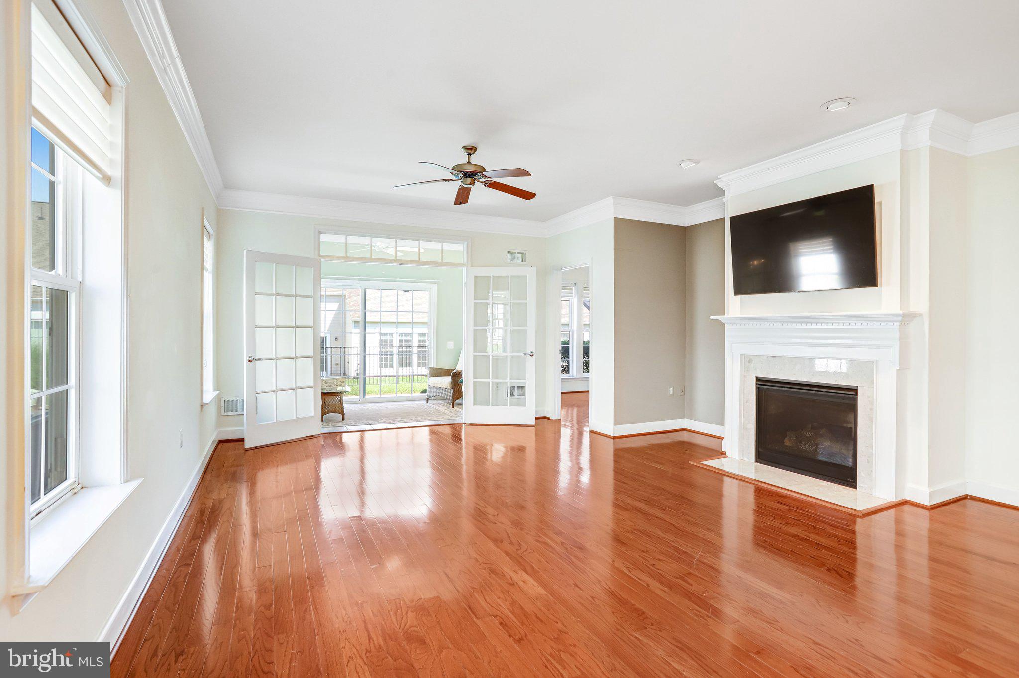 44406 Adare Manor Square Ashburn, VA 20147 - Photo 8 of 58 Family Room Leads to Sunroom