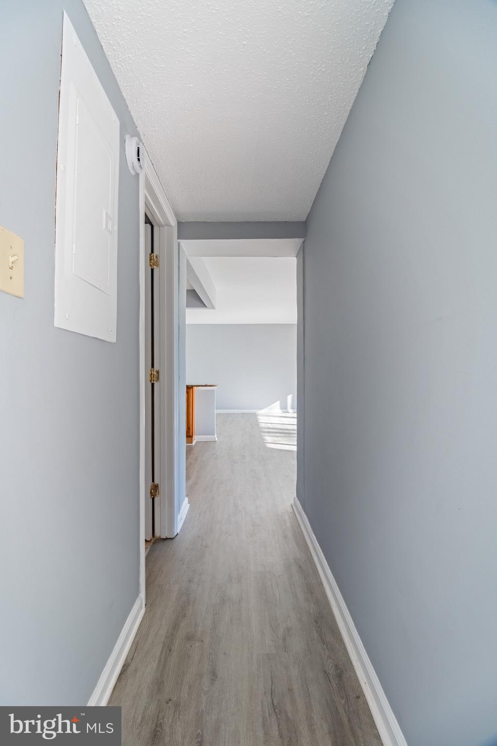 1822 Metzerott Road, Unit 205 Adelphi, MD 20783 - Photo 16 of 21 a view of a hallway with wooden floor