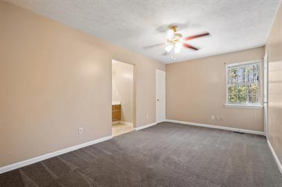 7253 Crestside Drive Austell, GA 30168 - Photo 11 of 14 an empty room with windows and fan
