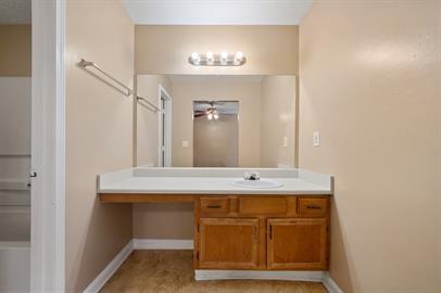 7253 Crestside Drive Austell, GA 30168 - Photo 13 of 14 a bathroom with a sink vanity and a mirror