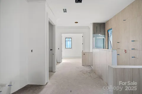 an empty room with a large window