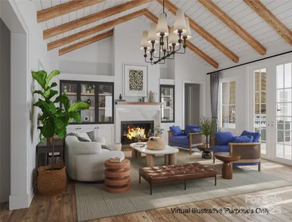 a living room with furniture a chandelier and a fireplace