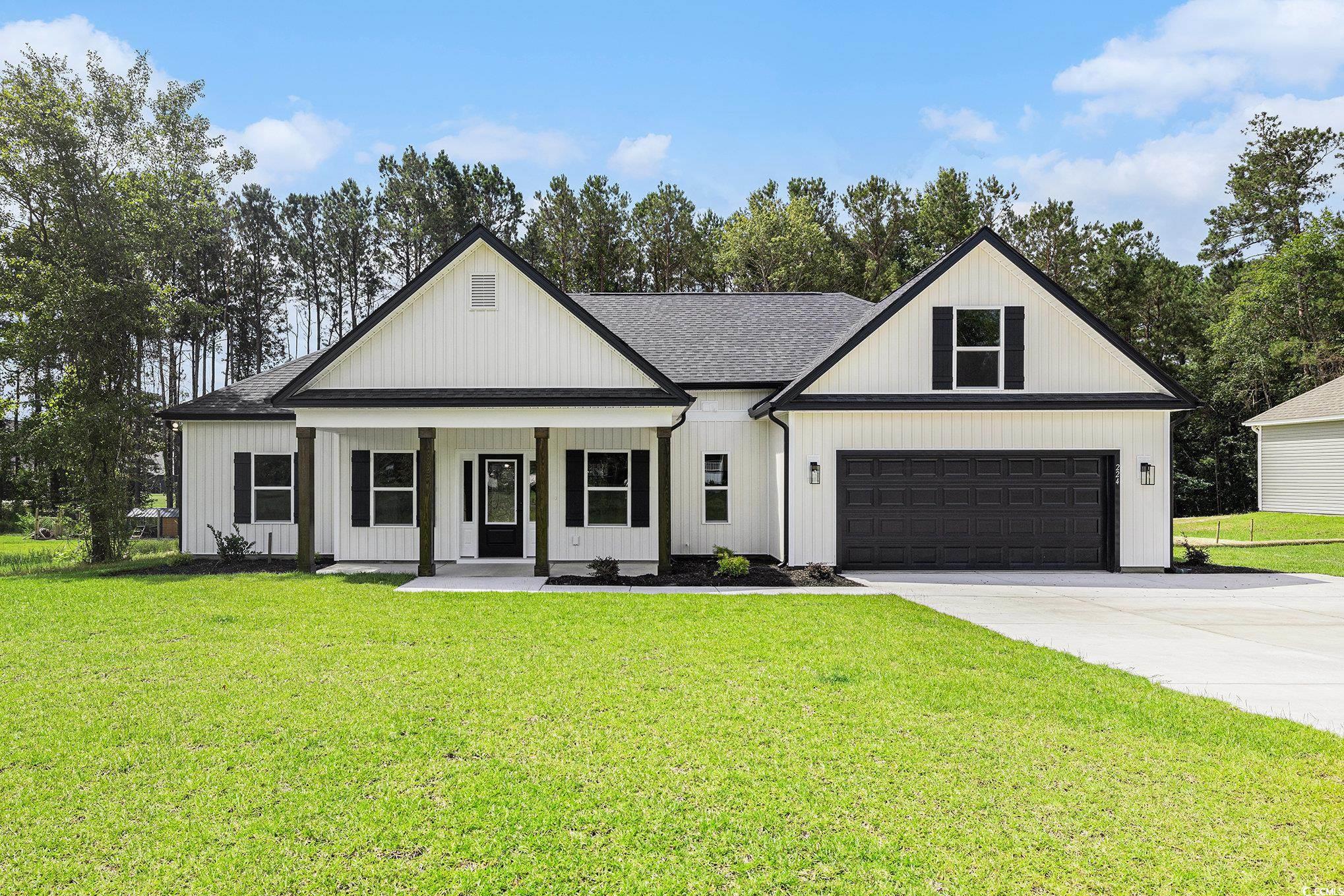 224 William Nobles Road Aynor, SC 29511 - Photo 3 of 30 Modern farmhouse with driveway, a front yard, roof