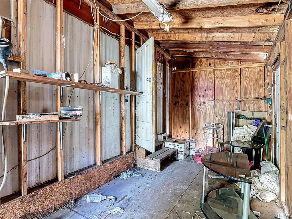 13005 Florida Avenue Astatula, FL 34705 - Photo 33 of 48 a view of a room with gym equipment