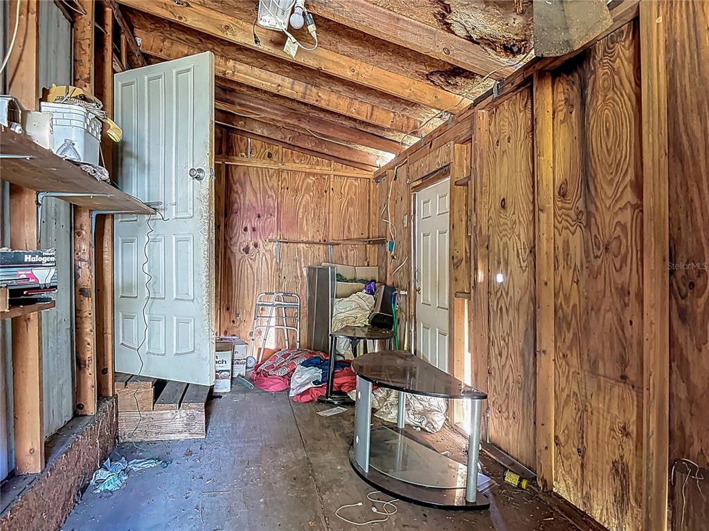 13005 Florida Avenue Astatula, FL 34705 - Photo 34 of 48 a view of a room with gym equipment