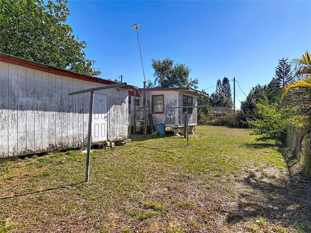 13005 Florida Avenue Astatula, FL 34705 - Photo 38 of 48 a view of a backyard