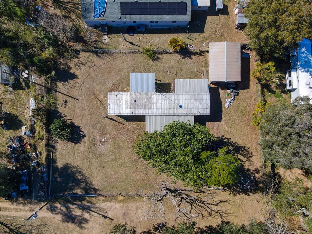 13005 Florida Avenue Astatula, FL 34705 - Photo 45 of 48 an aerial view of residential houses with outdoor space