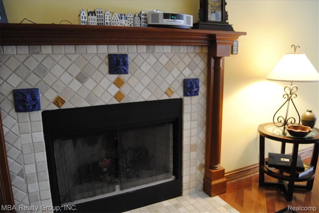 2000 Carleton Rockwood Road Carleton, MI 48117 - Photo 17 of 25 Great Room natural fireplace