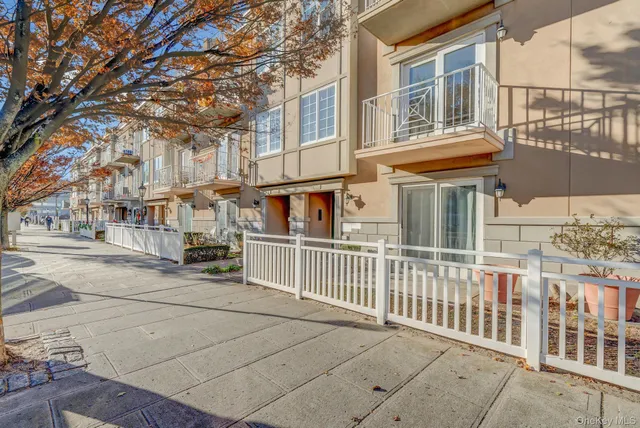 a view of a building with a bench