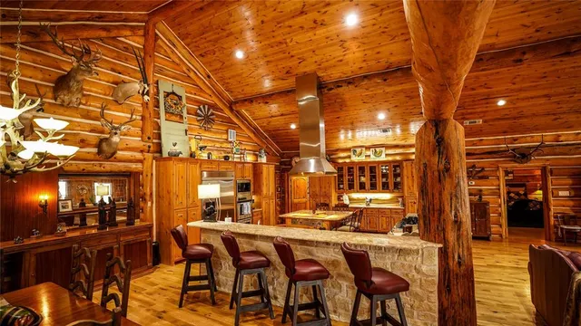 a kitchen with sink cabinets and stainless steel appliances