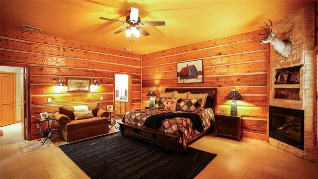 a bedroom with a bed and a table