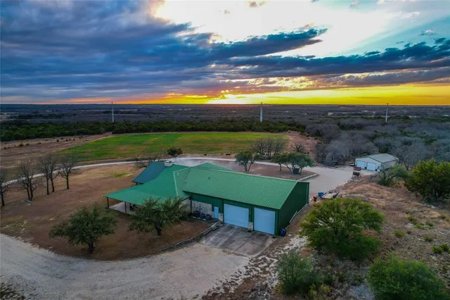 a view of a city with a lake