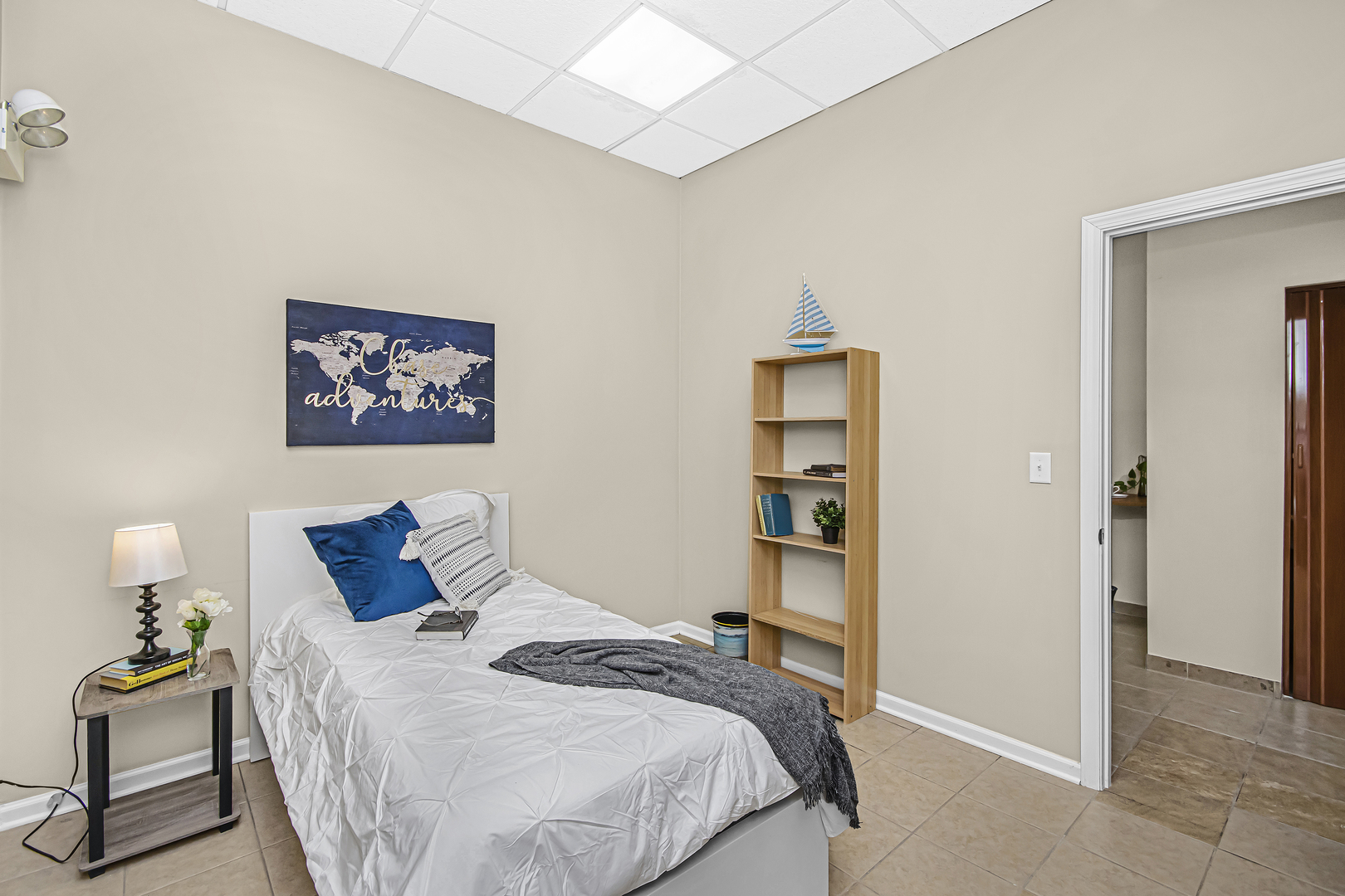 4346 North Pulaski Road, Unit C Chicago, IL 60641 - Photo 14 of 21 a bedroom with a bed and a lamp on dresser